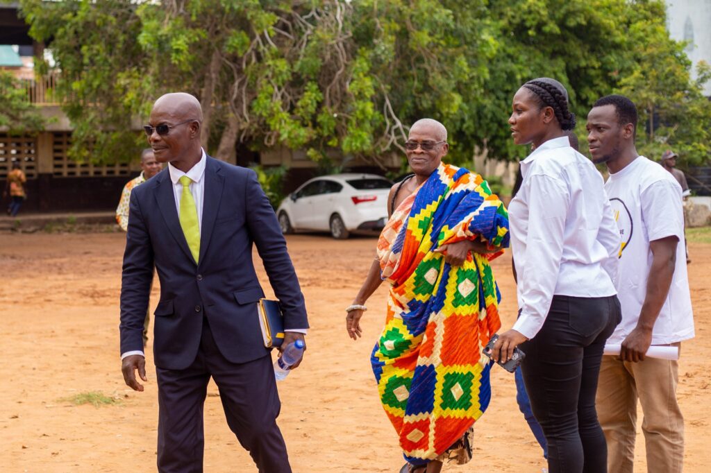 A distinguished guest and a traditional leader at the sanitary pad donation event
