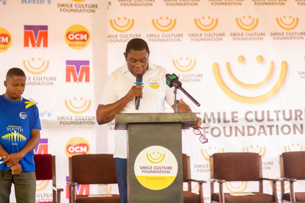 Smile Culture Foundation chairman addressing the community about the sanitary pad initiative