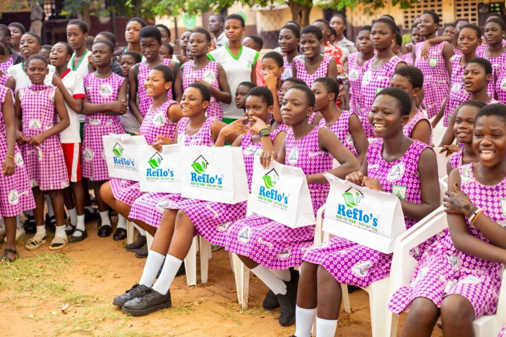Schoolgirls celebrate at the Smile Culture Foundation hygiene outreach